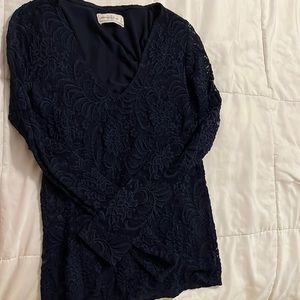 This Abercrombie dark blue lace blouse/long sleeve shirt is elegant.